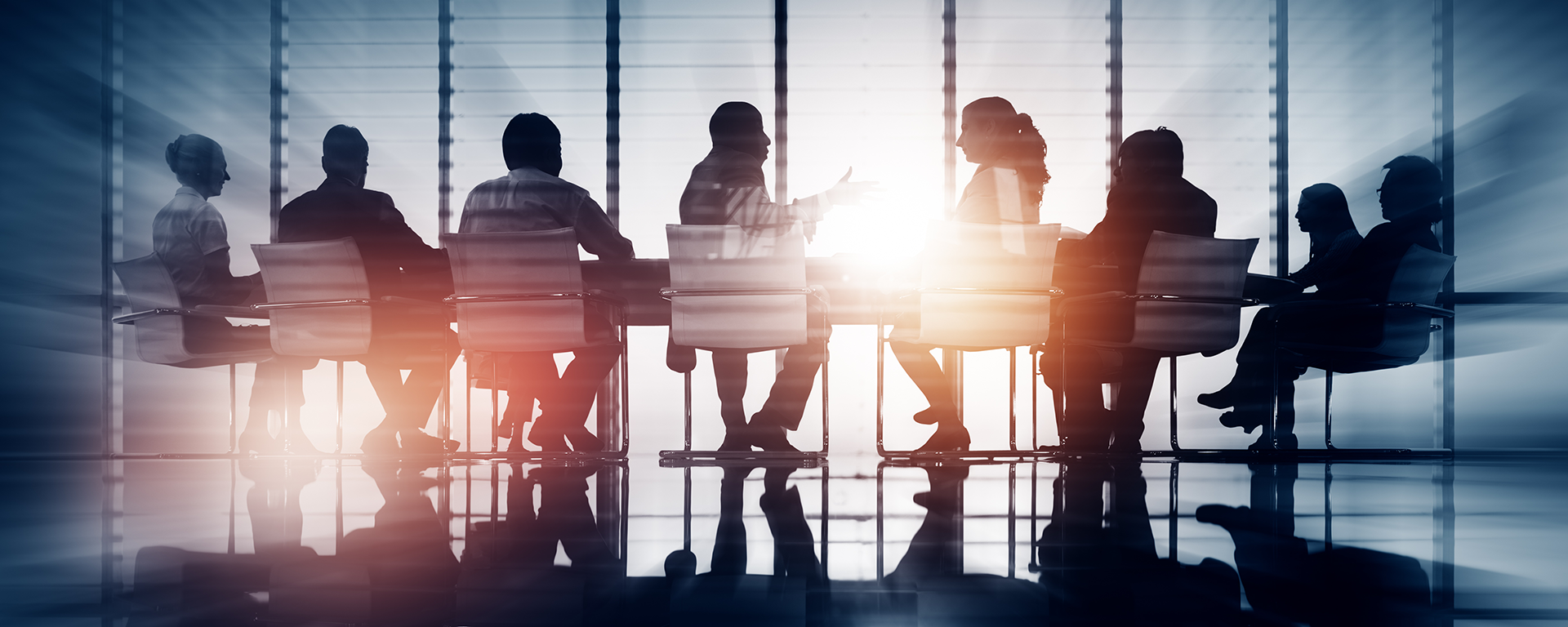 Group of business people around a table