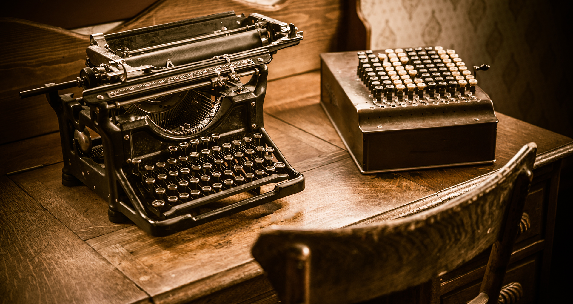 accountant's desk with typewriter and adding machine